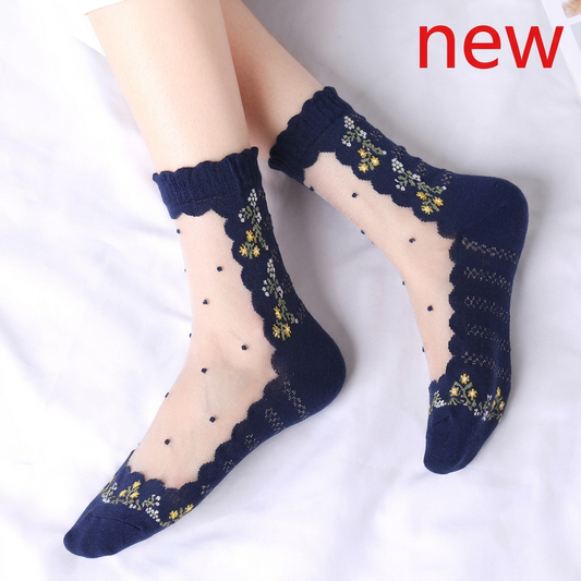 Enhanced worn navy floral sheer socks with red new text at upper right