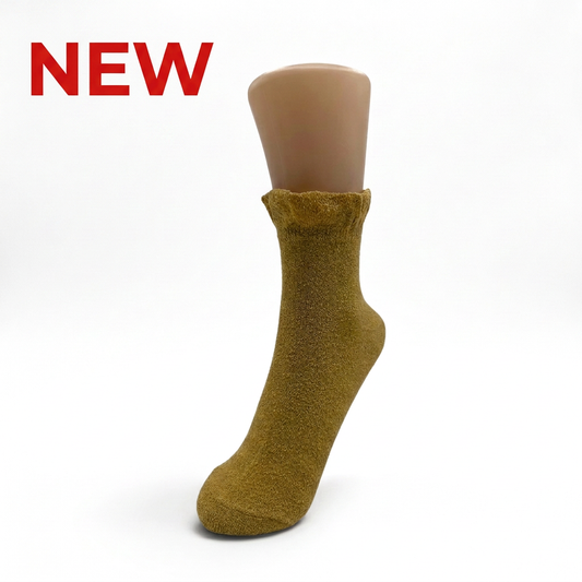 Mustard yellow bouclé frill sock with red NEW text at the upper left