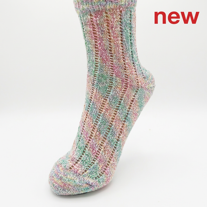 Rainbow sock in a square pure-white frame with red new text