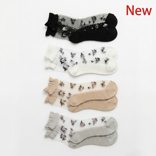 Sheer floral socks in a square white frame with red New at upper right